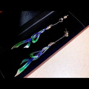 Exotic draped silver earrings